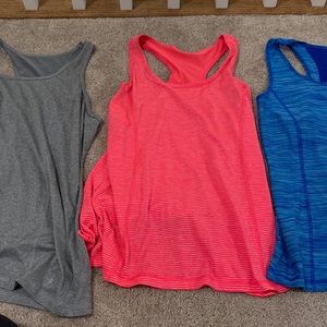 LOT Set of 3 danskin large razor back semi fitted and fitted tank tops